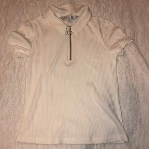 white quarter-zipped collared top